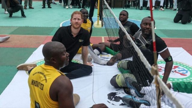 Britain’s Prince Harry (2nd L), Duke of Sussex, takes part in an exhibition sitting volleyball match at Nigeria Unconquered, a local charity organisation that supports wounded, injured, or sick servicemembers, in Abuja on May 11, 2024, as they visit Niger